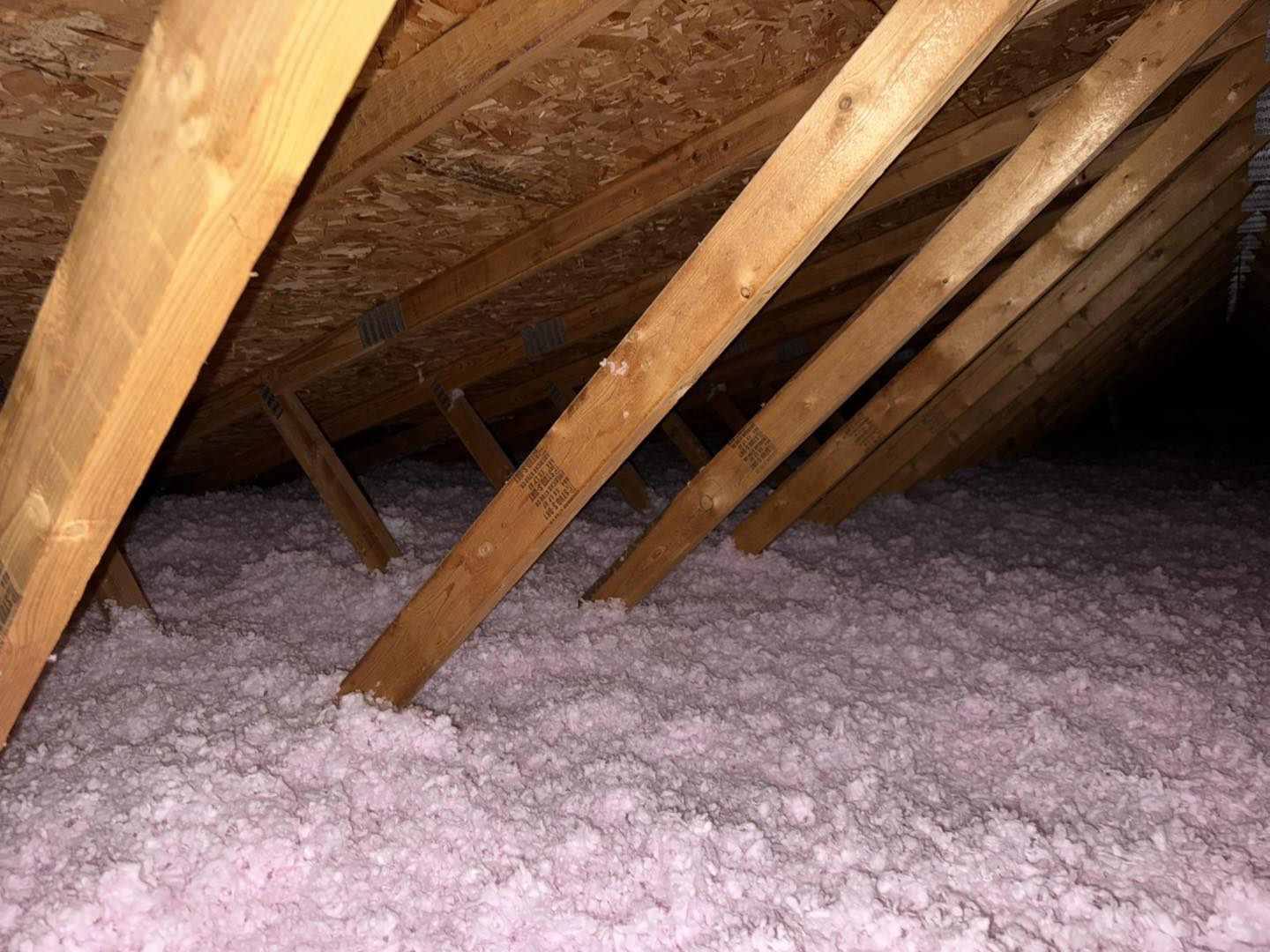 blown-in fiberglass insulation in attic